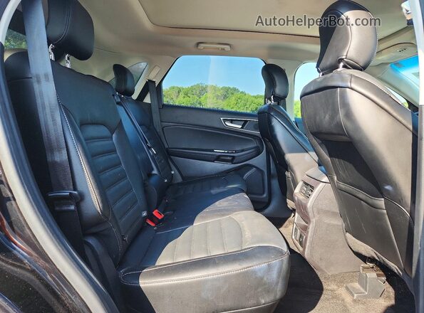 2FMPK4J99JBC21928 2018 FORD EDGE Черный Вид задней части салона