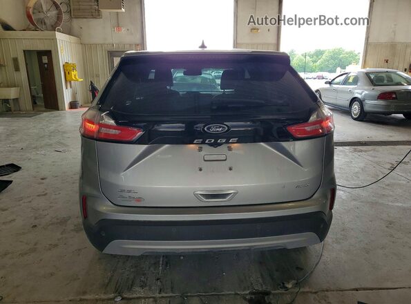 2FMPK4J99MBA49565 2021 FORD EDGE Silver უკანა ხედი