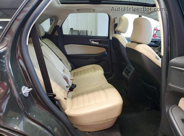 2FMPK4J99NBA05597 2022 FORD EDGE Green Vista de los asientos traseros