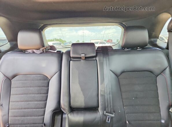 2FMPK4J99RBA49251 2024 FORD EDGE Red Rear seats view