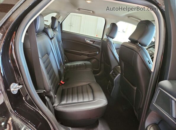 2FMPK4J99RBB06791 2024 FORD EDGE Black Vista interior trasera