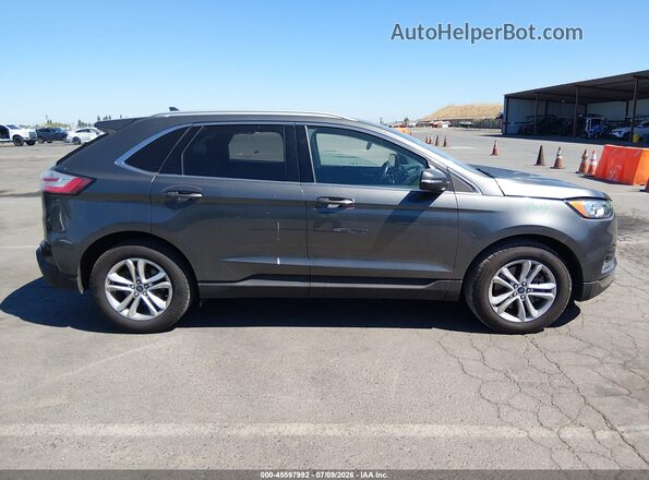 2FMPK4J9XKBB70196 2019 FORD EDGE Серый Вид задней части салона