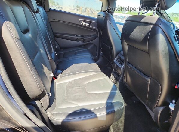 2FMPK4K81JBC33254 2018 FORD EDGE Black Вид задньої частини салону