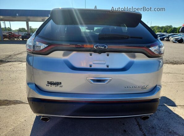2FMPK4K82HBB64715 2017 FORD EDGE Silver Вид ззаду
