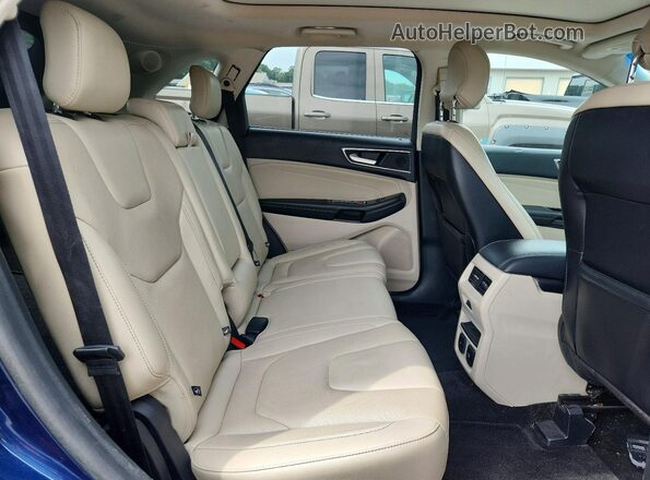 2FMPK4K83HBC66881 2017 FORD EDGE Blue Widok wnętrza z tyłu