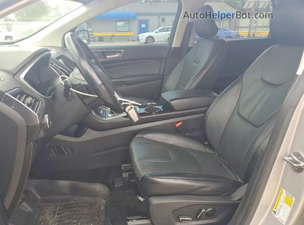 2FMPK4K83JBC02362 2018 FORD EDGE Серебряный Вид салона спереди