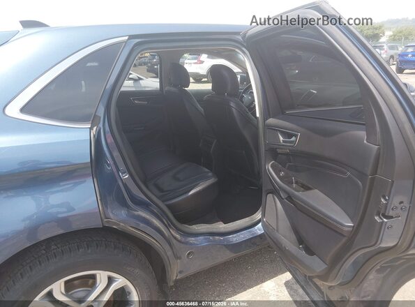 2FMPK4K86JBC02064 2018 FORD EDGE Light Blue VIN კოდის სტიკერის ხედი