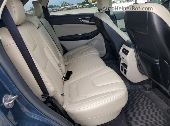 2FMPK4K90KBB12497 2019 FORD EDGE Blue Սալոնի հետևի տեսք