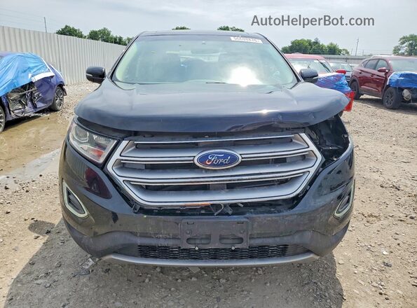 2FMPK4K91HBB82566 2017 FORD EDGE Black Widok z przodu
