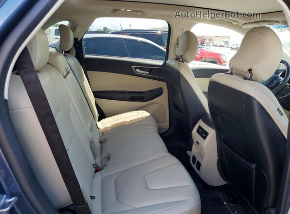 2FMPK4K91JBC22862 2018 FORD EDGE Blue Вид задньої частини салону