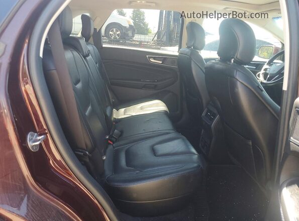 2FMPK4K93KBB79773 2019 FORD EDGE Maroon Vista interior trasera