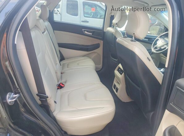 2FMPK4K93KBC64306 2019 FORD EDGE Black Vista interior trasera