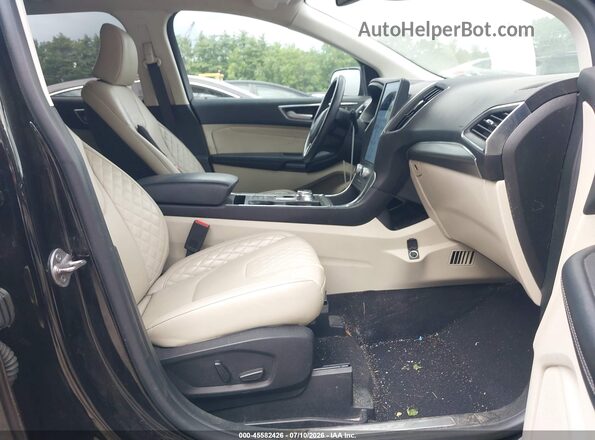 2FMPK4K93PBA14104 2023 FORD EDGE Черный Вид салона спереди