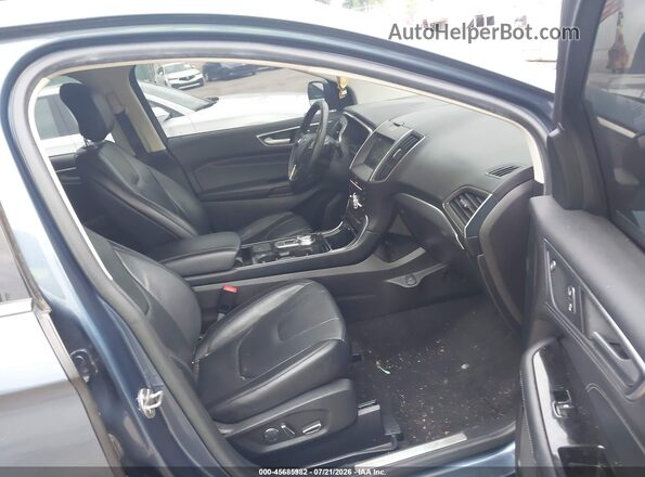 2FMPK4K94KBB74114 2019 FORD EDGE Blue Front interior view