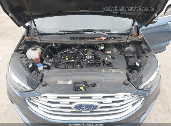 2FMPK4K94KBB74114 2019 FORD EDGE Blue Rear view