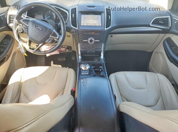 2FMPK4K94KBB93634 2019 FORD EDGE Серебряный Вид панели приборов