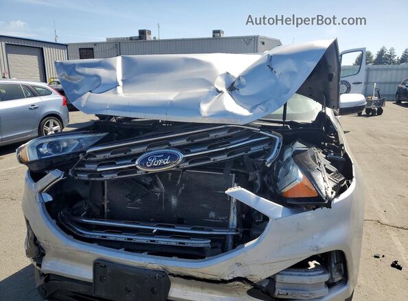 2FMPK4K94KBB93634 2019 FORD EDGE Серебряный Вид задней части салона