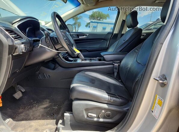 2FMPK4K94KBC22629 2019 FORD EDGE Серебряный Вид салона спереди