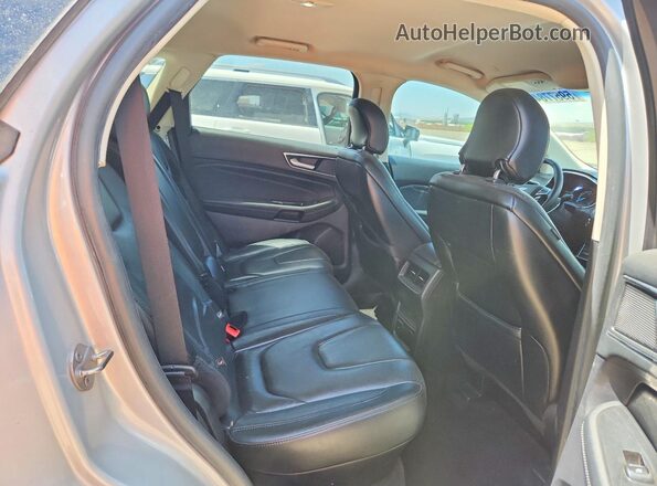 2FMPK4K94KBC22629 2019 FORD EDGE Серебряный Вид задней части салона