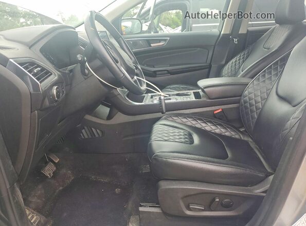 2FMPK4K94PBA30263 2023 FORD EDGE Silver Front interior view