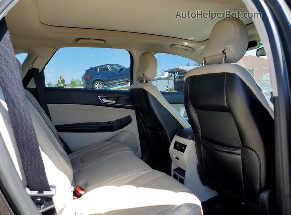 2FMPK4K95KBC52884 2019 FORD EDGE Black Вид задньої частини салону
