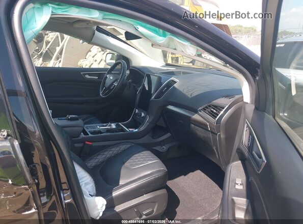 2FMPK4K95PBA00768 2023 FORD EDGE Black Вид салону спереду
