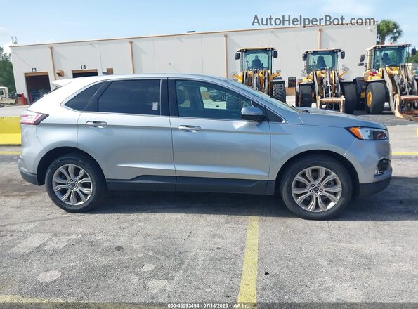 2FMPK4K96RBA52493 2024 FORD EDGE Silver Widok wnętrza z tyłu