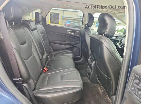 2FMPK4K97KBC55897 2019 FORD EDGE Blue Vista de los asientos traseros