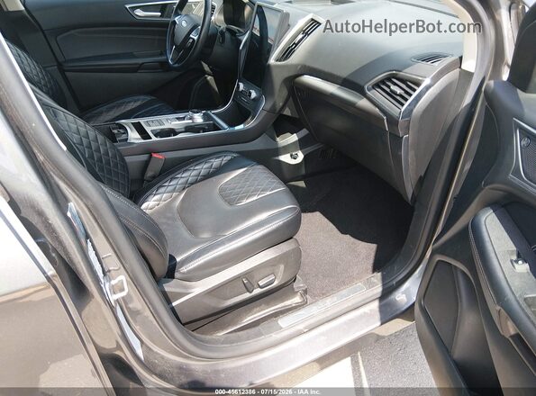 2FMPK4K97PBA19144 2023 FORD EDGE Серый Вид салона спереди
