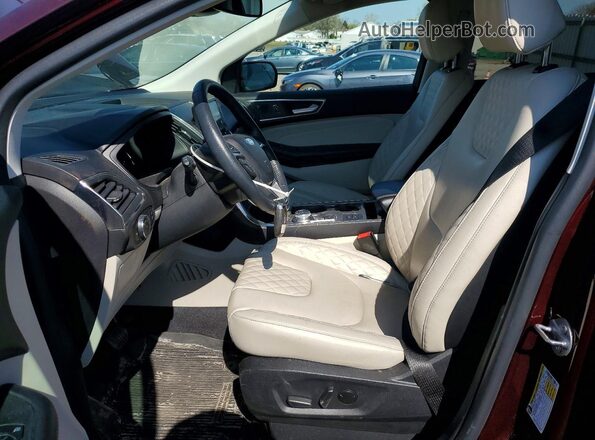 2FMPK4K97RBA04811 2024 FORD EDGE Maroon Front interior view