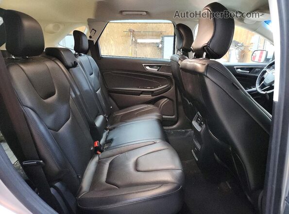 2FMPK4K98JBB06820 2018 FORD EDGE Silver Rear interior view