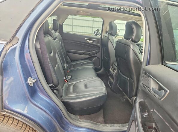 2FMPK4K98KBB70468 2019 FORD EDGE Blue Widok wnętrza z tyłu