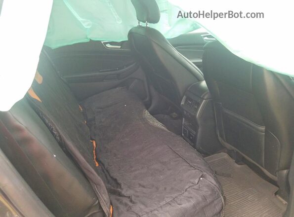 2FMPK4K98KBC65726 2019 FORD EDGE Charcoal Vista interior trasera