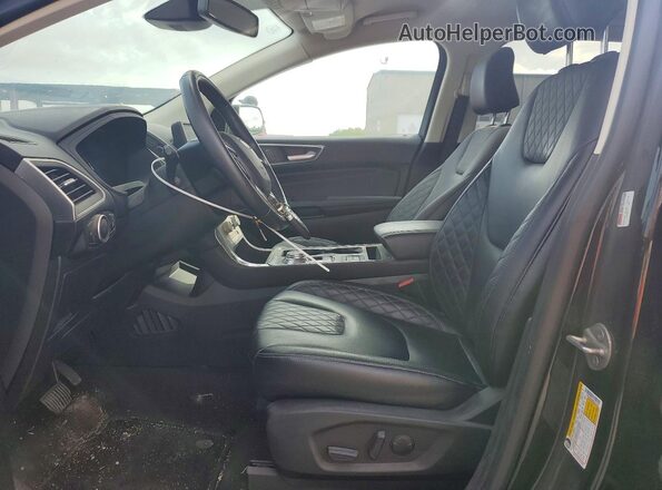 2FMPK4K98RBA51667 2024 FORD EDGE Black Vista interior delantera