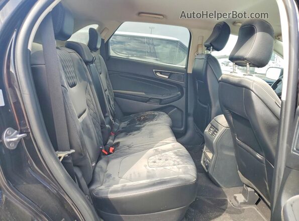 2FMPK4K98RBA51667 2024 FORD EDGE Black Vista interior trasera
