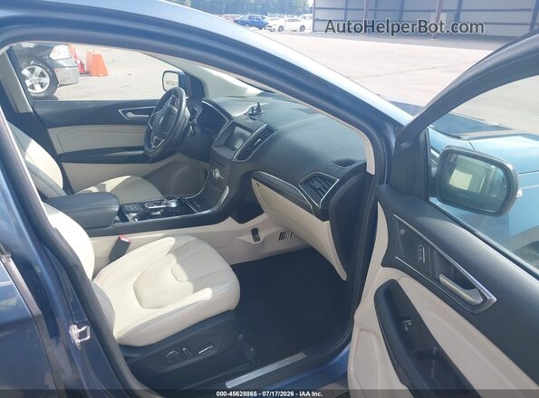 2FMPK4K99KBB12143 2019 FORD EDGE Синий Вид салона спереди