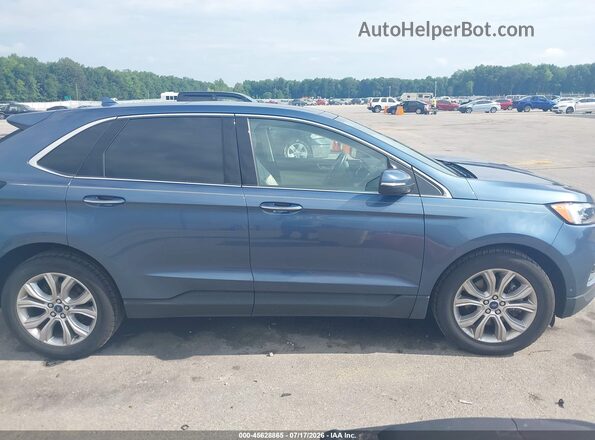 2FMPK4K99KBB12143 2019 FORD EDGE Синий Вид задней части салона