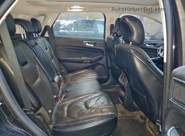 2FMPK4K99KBB58555 2019 FORD EDGE Black Vista interior trasera