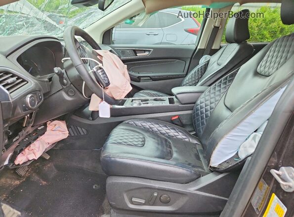 2FMPK4K99RBB27039 2024 FORD EDGE Черный Вид салона спереди