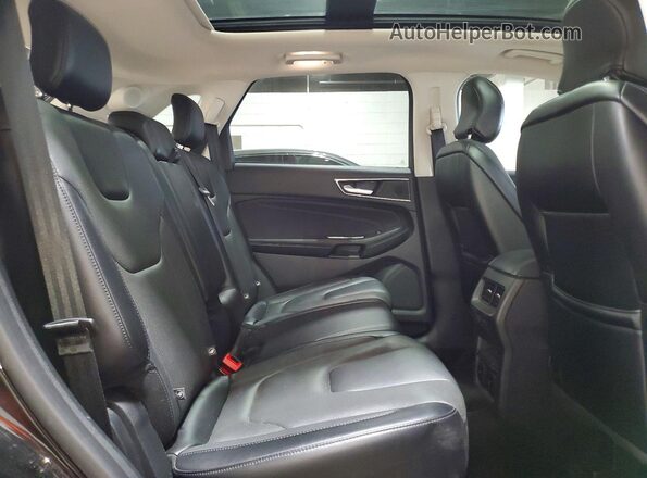2FMPK4K9XJBB75654 2018 FORD EDGE Black Widok wnętrza z tyłu