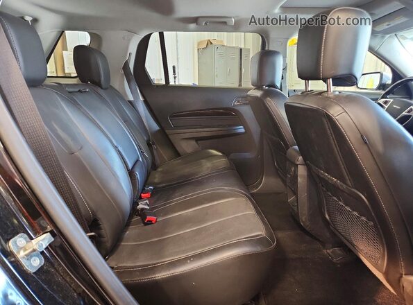 2GKFLVEKXG6191425 2016 GMC TERRAIN Black Rear interior view