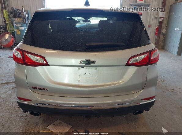 2GNAXLEX9K6281210 2019 CHEVROLET EQUINOX Серебряный 