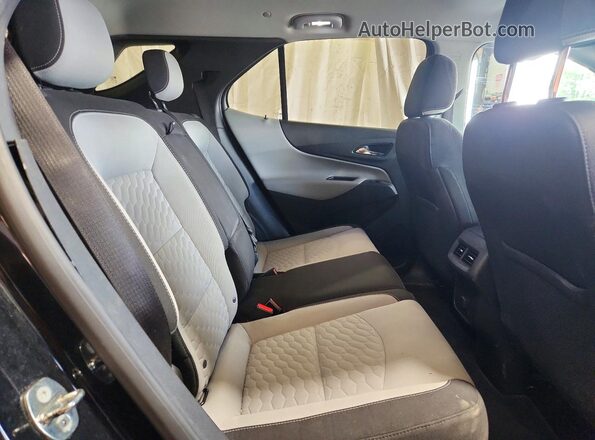 2GNAXTEX2J6173817 2018 CHEVROLET EQUINOX Black Widok wnętrza z tyłu