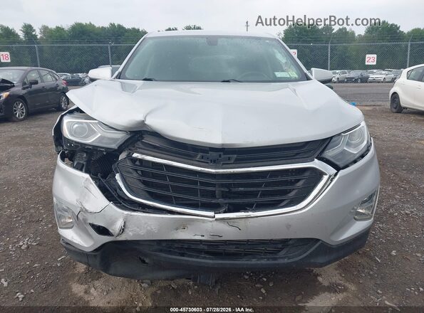 2GNAXUEV2K6261174 2019 CHEVROLET EQUINOX Silver Вид задньої частини салону