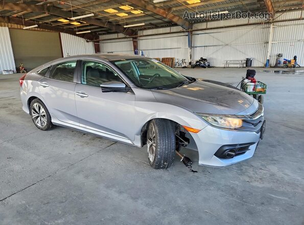 2HGFC1F34GH645301 2016 HONDA CIVIC Gray Передня права чверть
