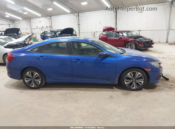 2HGFC1F35HH656955 2017 HONDA CIVIC Blue Rear interior view