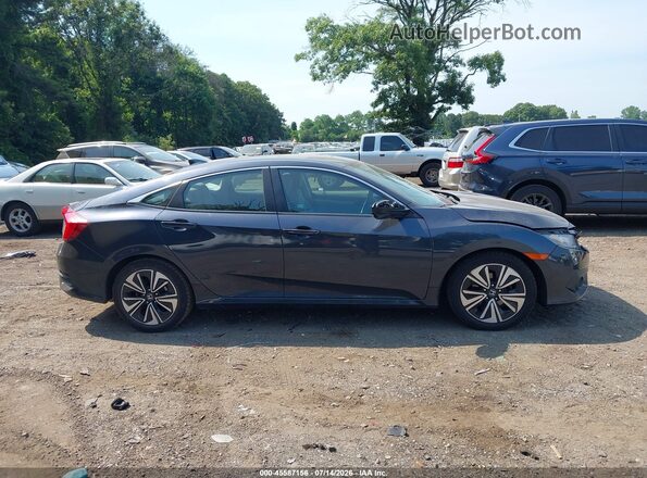 2HGFC1F35HH657135 2017 HONDA CIVIC Blue Սալոնի հետևի տեսք
