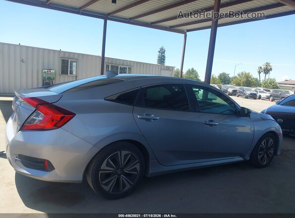 2HGFC1F36GH649804 2016 HONDA CIVIC Silver Widok wnętrza z tyłu