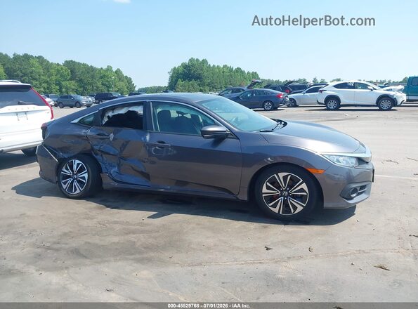 2HGFC1F37HH638702 2017 HONDA CIVIC Серый Вид задней части салона