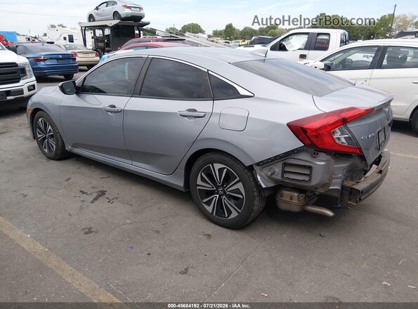2HGFC1F38GH640649 2016 HONDA CIVIC Silver Trasero izquierdo